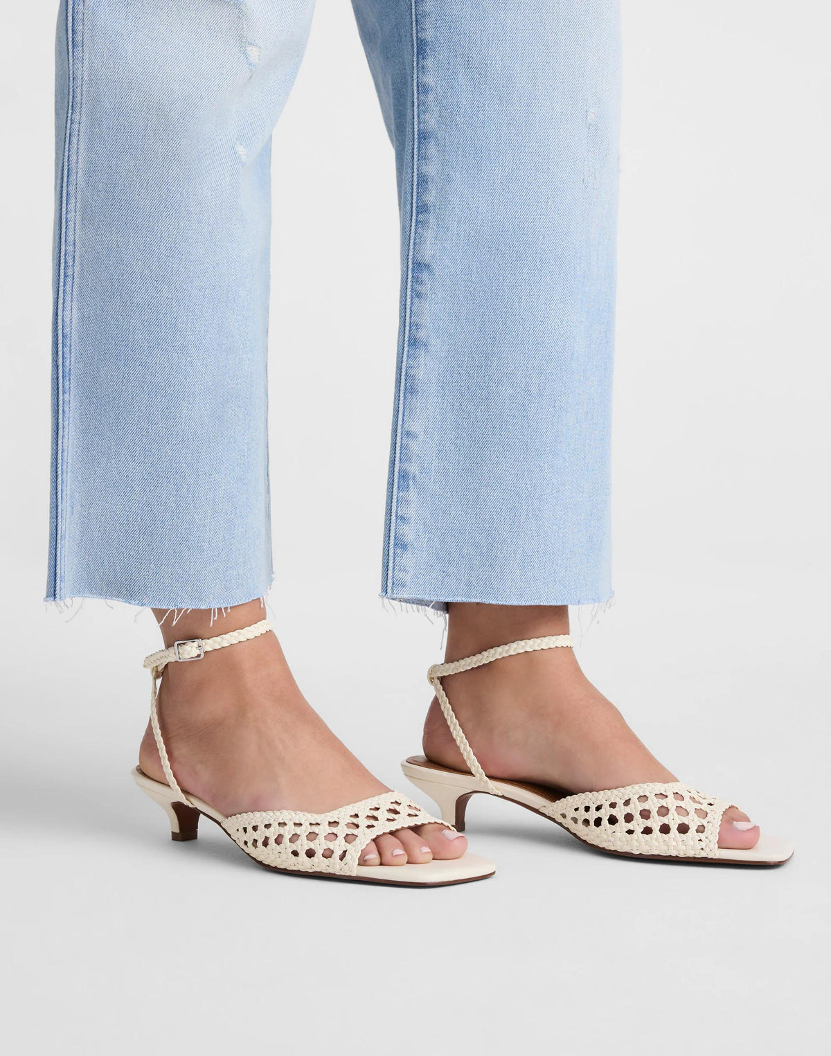 The Tyra Ankle-Strap Kitten-Heel Sandal in Woven Leather