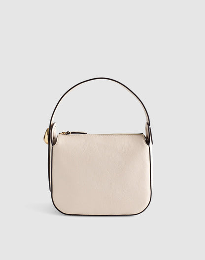 The Sculpted Metal Wristlet Bag