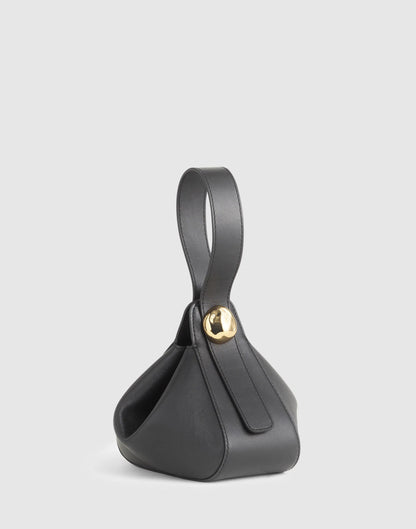 The Sculpted Metal Wristlet Bag